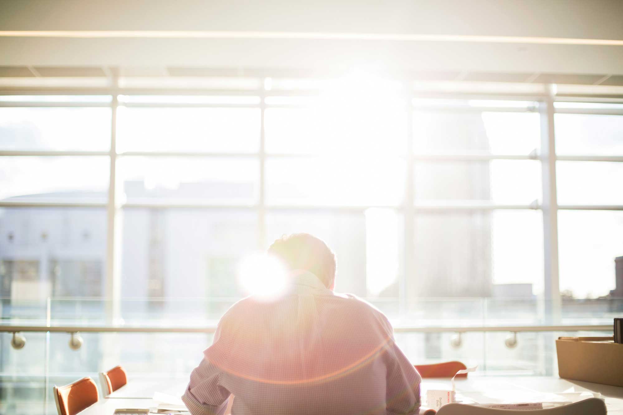 man-reading-in-office