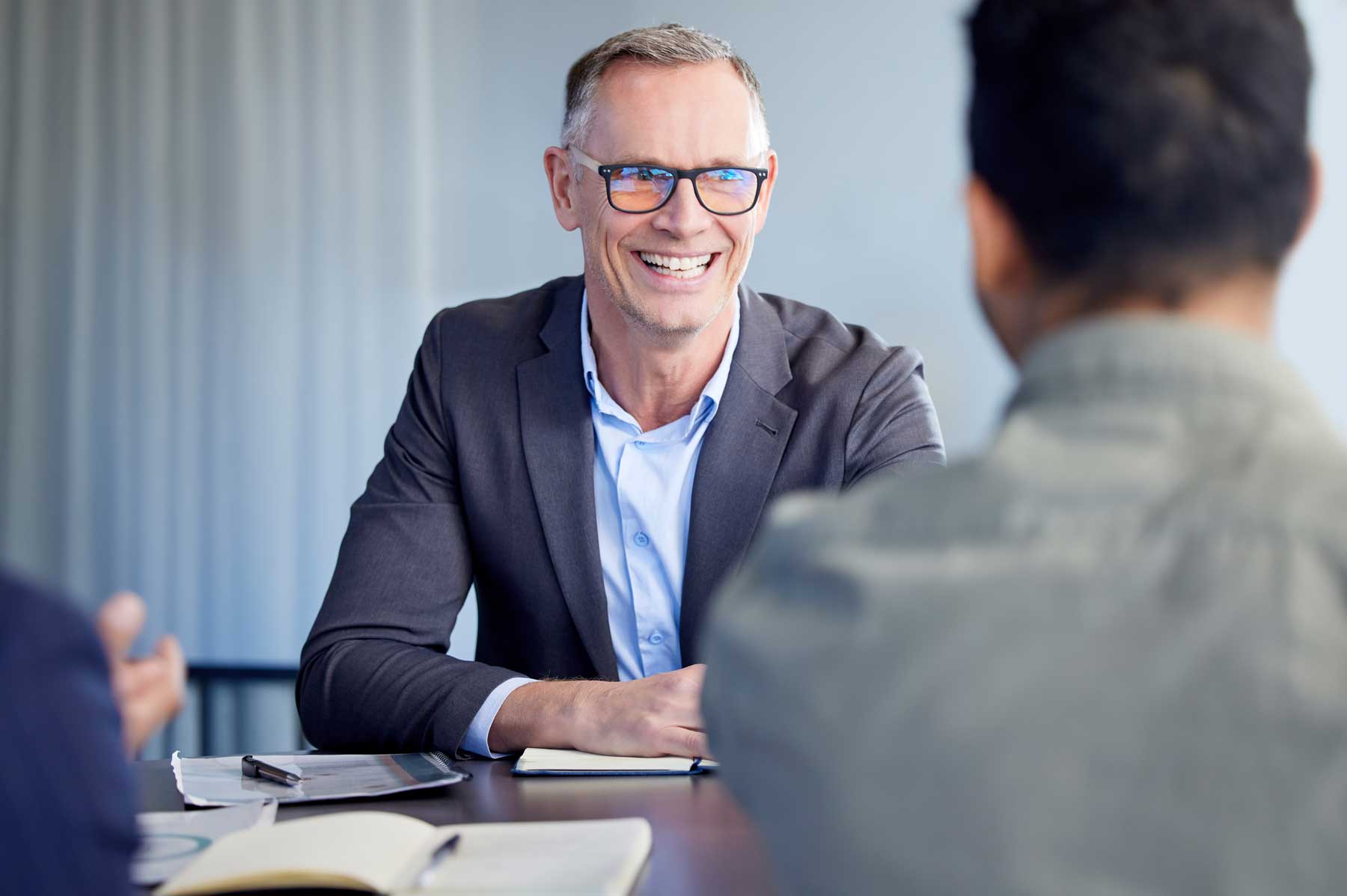 shot-of-two-businessmen-having-a-meeting-in-an-office